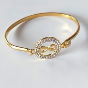 Cuff bracelet stainless steel gold color, with INFINITY SYMBOL and middle piece